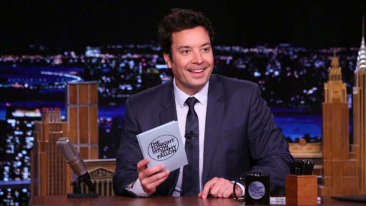 THE TONIGHT SHOW STARRING JIMMY FALLON -- Episode 1431 -- Pictured: Host Jimmy Fallon arrives at his desk on Wednesday, March 24, 2021 -- (Photo by: Andrew Lipovsky/NBC)