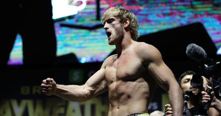 MIAMI GARDENS, FLORIDA - JUNE 05:  Logan Paul takes part in the weigh-in ahead of his June 6 exhibition boxing match against Floyd Mayweather on June 5, 2021 at Hard Rock Live at Seminole Hard Rock Casino in Miami Gardens, Florida. (Photo by Cliff Hawkins/Getty Images)