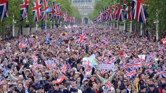 Thousands of people gather in central London for a pageant