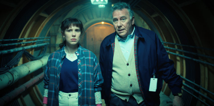 STRANGER THINGS. (L to R) Millie Bobby Brown as Eleven and Paul Reiser as Dr. Owens in STRANGER THINGS. Cr. Courtesy of Netflix © 2022