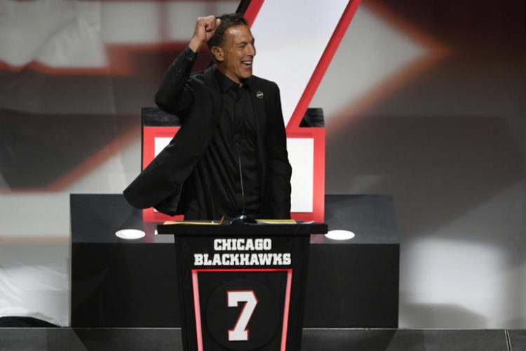 Former Chicago Blackhawks great Chris Chelios has his jersey retired during a ceremony before an NHL hockey game between the Chicago Blackhawks and Detroit Red Wings Sunday, Feb. 25, 2024, in Chicago.