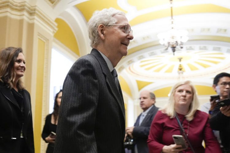 Senate Minority Leader Mitch McConnell of Ky., walks to the Senate to speak on the Senate floor, Wednesday, Feb. 28, 2024 at the Capitol in Washington.
