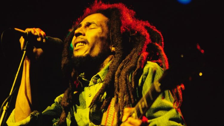 UNITED KINGDOM - JULY 01:  Photo of Bob MARLEY; Bob Marley performing live on stage at the Brighton Leisure Centre  (Photo by Mike Prior/Redferns)