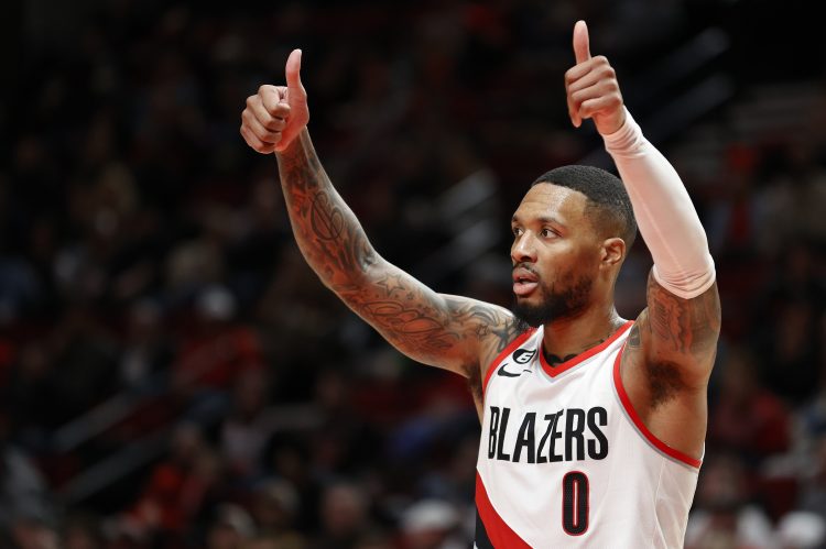 PORTLAND, OREGON - JANUARY 23: Damian Lillard #0 of the Portland Trail Blazers reacts during the third quarter against the San Antonio Spurs at Moda Center on January 23, 2023 in Portland, Oregon. NOTE TO USER: User expressly acknowledges and agrees that, by downloading and/or using this photograph, User is consenting to the terms and conditions of the Getty Images License Agreement. (Photo by Steph Chambers/Getty Images)
