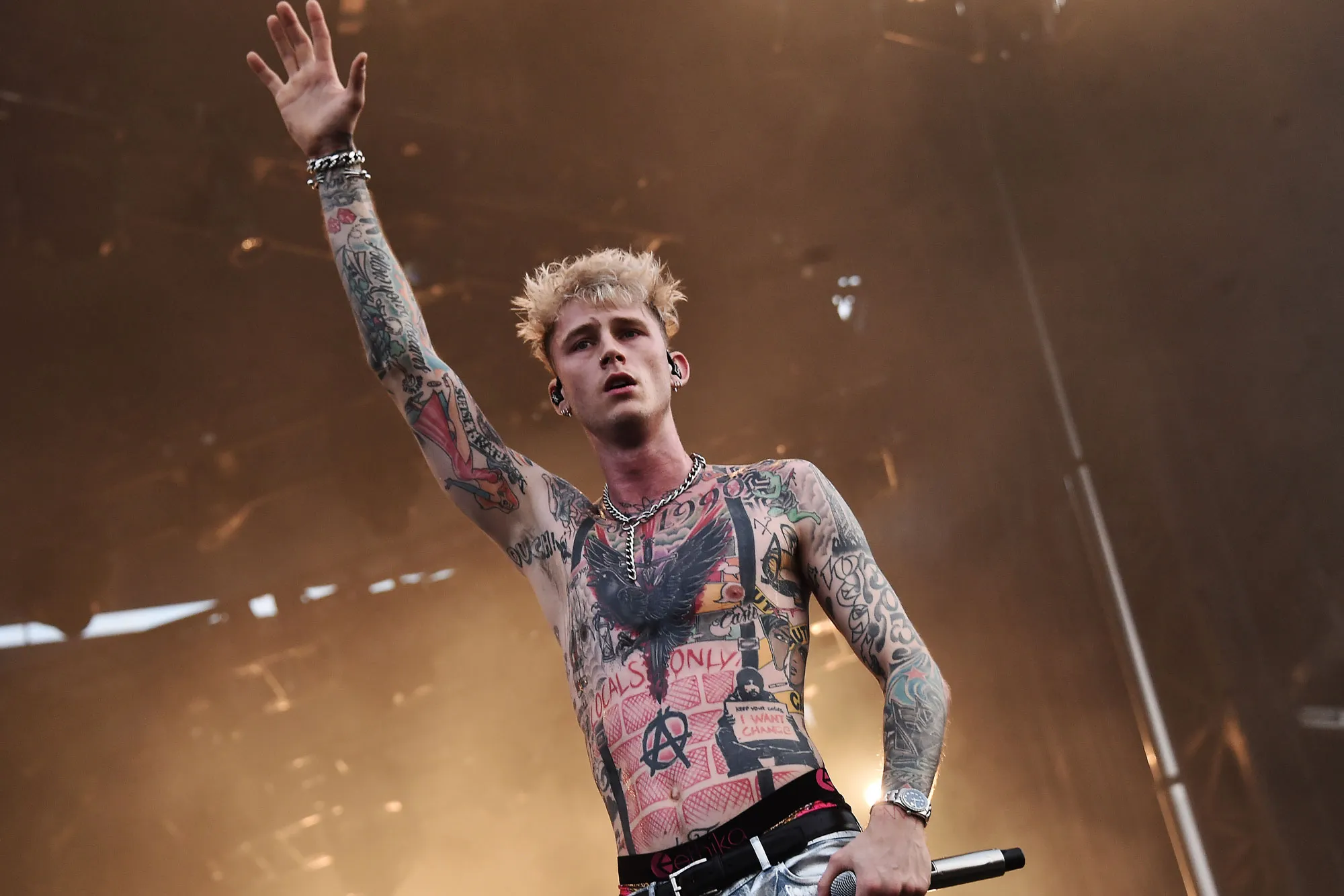 Machine Gun Kelly's Transformation Exploring His Dramatic Tattoo Cover