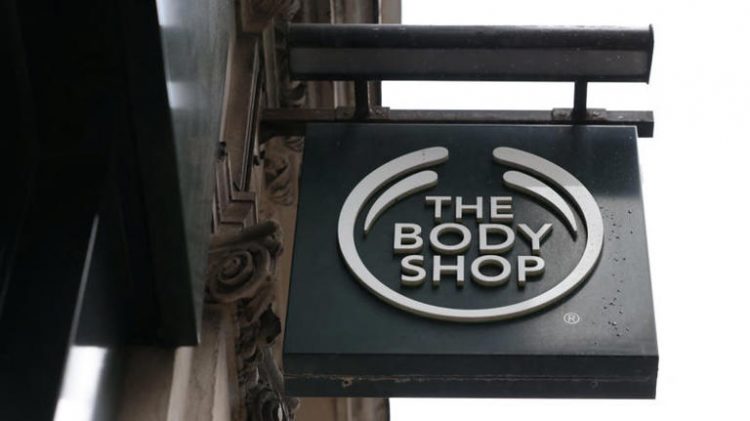 The Body Shop sign is seen at a store in London.
© Photo: Hollie Adams (Reuters)