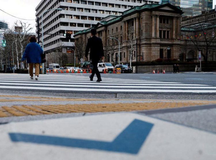 FILE PHOTO: People walk in front of the Bank of Japan building in Tokyo, Japan January 23, 2024. REUTERS/Kim Kyung-Hoon/File Photo
© Thomson Reuters