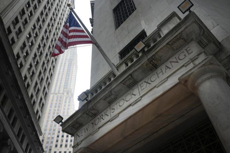 Wall Street gained Friday, pushing the stocks to fresh records on excitement about cooling inflation and a mostly resilient U.S. economy. ((Seth Wenig / Associated Press))
© Provided by LA Times