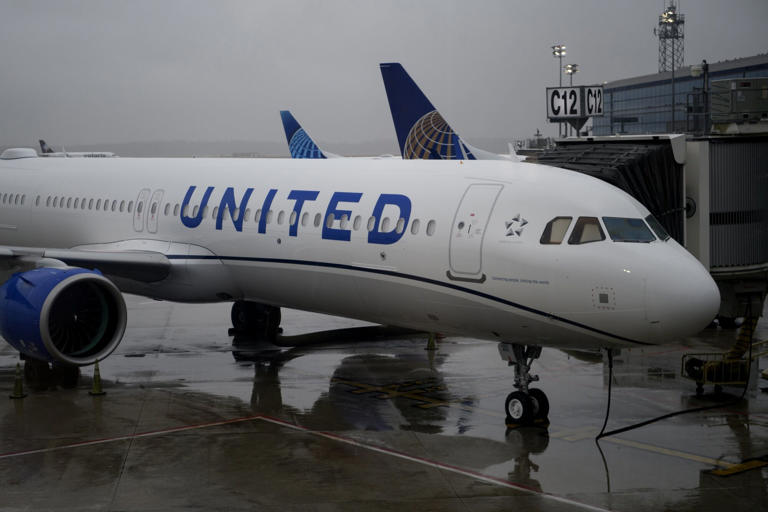 United Airlines flight rolls off runway at Houston airport