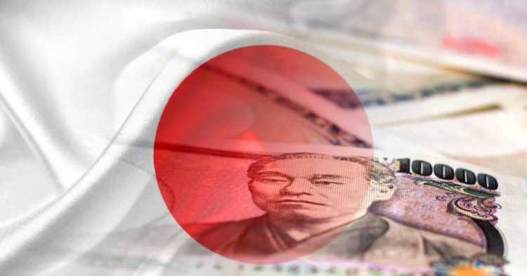 Japan flag and Japanese Yen cash banknotes (money, economy, business, finance, inflation, crisis)
© Provided by CNBC