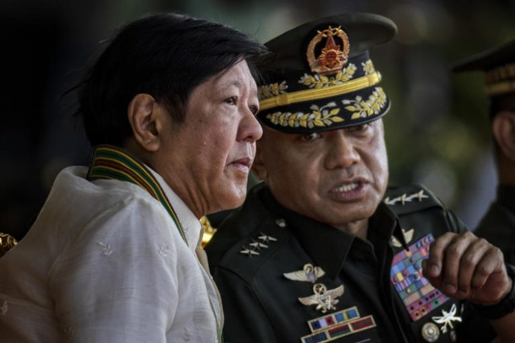 Philippine President Ferdinand Marcos Jr., left, and Philippine Army Commanding General Romeo Brawner Jr. attend the 126th founding anniversary of the Philippine Army at Fort Bonifacio on March 22, 2023, in Taguig, Metro Manila. Marcos has been more assertive than his predecessor, Rodrigo Duterte, in pushing back against Chinese intrusions into the Philippines' exclusive economic zone.
© Ezra Acayan/Getty Images