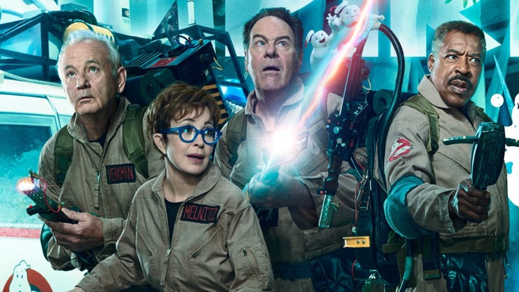 new ghostbusters frozen empire images feature the old and new ghostbuster teams and janine finally suits up