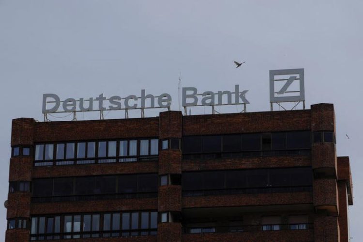 The logo of Deutsche Bank is seen on the roof of a building outside a Deutsche Bank branch office in Malaga, Spain, April 24, 2024. REUTERS/Jon Nazca/File Photo