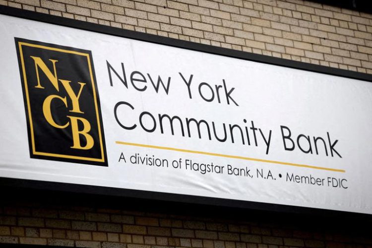 A sign is pictured above a branch of the New York Community Bank in Yonkers, New York, U.S., January 31, 2024. REUTERS/Mike Segar/File Photo