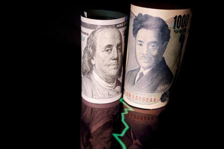 Japanese yen and U.S. dollar banknotes are seen with a currency exchange rate graph in this illustration picture taken June 16, 2022. REUTERS/Florence Lo/Illustration/File Photo