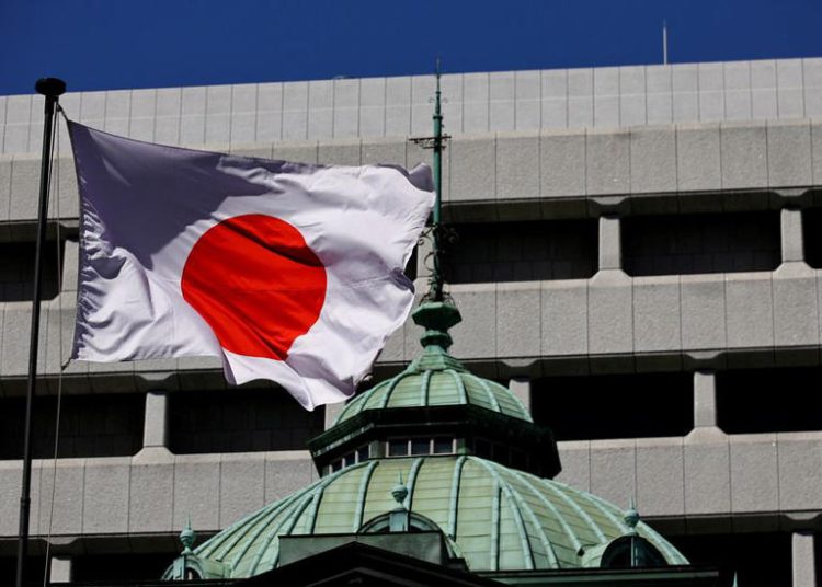 FILE PHOTO: The Japanese national flag waves at the Bank of Japan building in Tokyo, Japan March 18, 2024. REUTERS/Kim Kyung-Hoon/File Photo
© Thomson Reuters