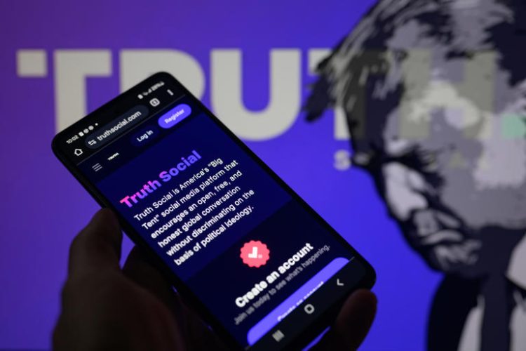 The Truth Social app is being displayed on a smartphone with Truth Social visible in the background. Trump’s 58.1 percent stake in the company, once valued at a high of roughly $5.5 billion, has depreciated to $2.4 billion.
© Jonathan Raa/NurPhoto via Getty Images