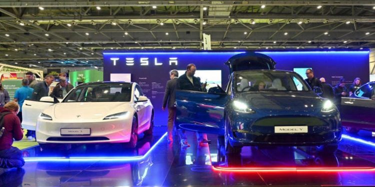 Tesla Model 3 and Model Y on display at the Everything Electric London 2024 show. John Keeble/Getty Images
© John Keeble/Getty Images