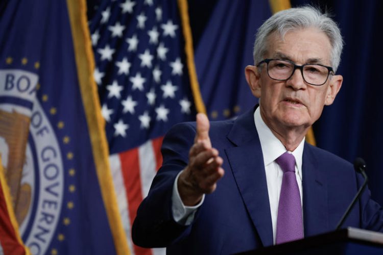 Federal Reserve Bank Chair Jerome Powell announces that interest rates will remain unchanged during a news conference at the bank's William McChesney Martin building on May 01, 2024 in Washington, DC. While interest rates remain high, Americans' savings accounts have been growing significantly.