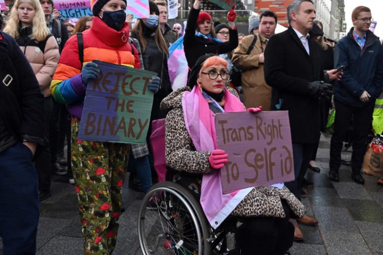 Demonstrators outside Queen Elizabeth House, the UK Government's headquarters in Scotland, protest against the UK Government's decision to block the Gender recognition Reform (Scotland) Bill, which was passed recently by the Scottish Parliament, on January 19, 2023 in Edinburgh, Scotland. Employers in the United States cite confusion as a reason for not accepting transgender employee's pronouns.