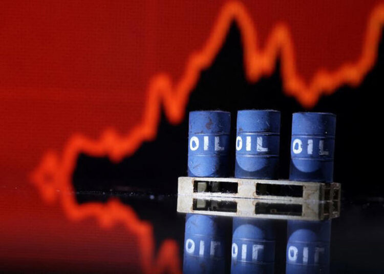 Model of Oil barrels are seen in front of rising stock graph in this illustration, July 24, 2022. REUTERS/Dado Ruvic/Illustration/File photo