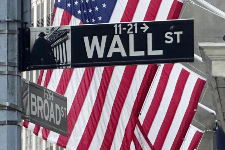 American flags fly on the front of the New York Stock Exchange near Broad and Wall streets on May 22, 2024.