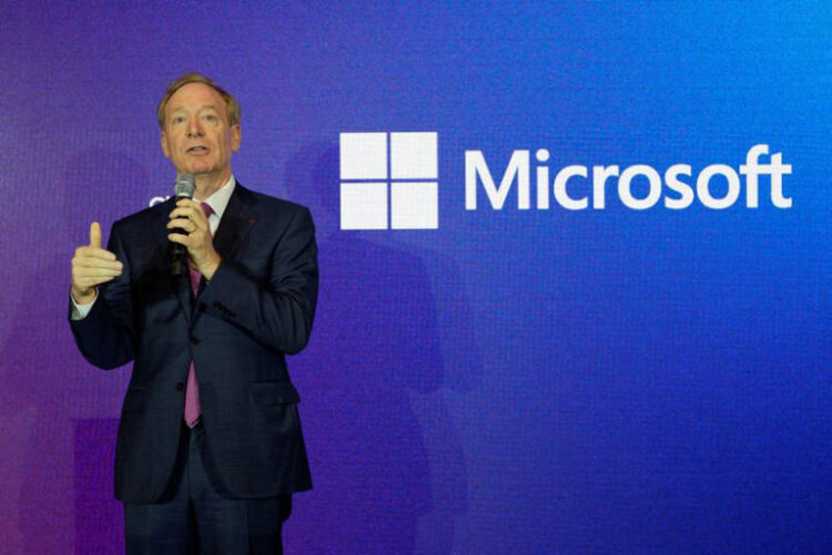 Microsoft Vice Chair and President Brad Smith delivers his speech at the French Microsoft headquarters in Issy-les-Moulineaux, outside Paris, Monday, May 13, 2024. Thibault Camus/Pool via REUTERS