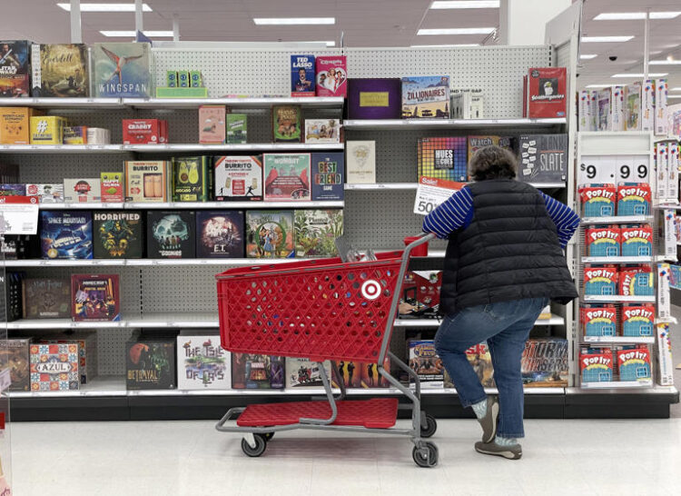 A Target customer looks at a display of board games while shopping at Target store. Justin Sullivan/Getty Images