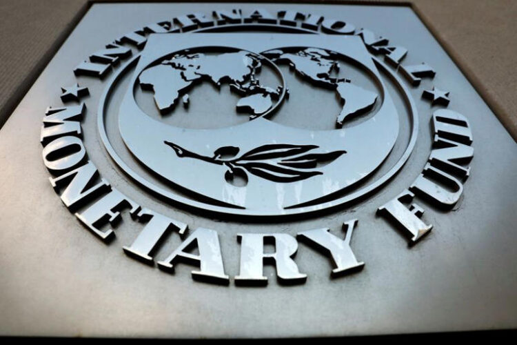 The International Monetary Fund (IMF) logo is seen outside the headquarters building in Washington, U.S., as IMF Managing Director Christine Lagarde meets with Argentine Treasury Minister Nicolas Dujovne September 4, 2018. REUTERS/Yuri Gripas/ File Photo