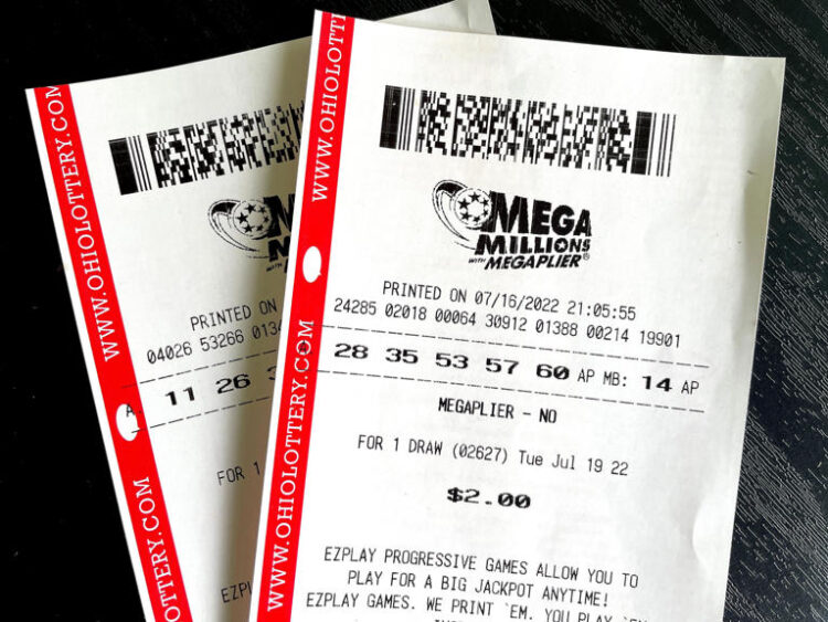 A Mega Millions ticket is pictured.
