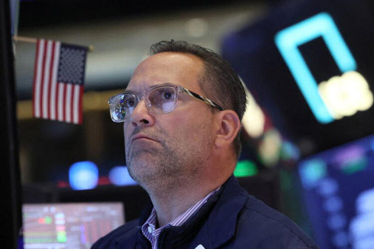 A specialist trader works at his post on the floor at the New York Stock Exchange (NYSE) in New York City, U.S., June 3, 2024. REUTERS/Brendan McDermid