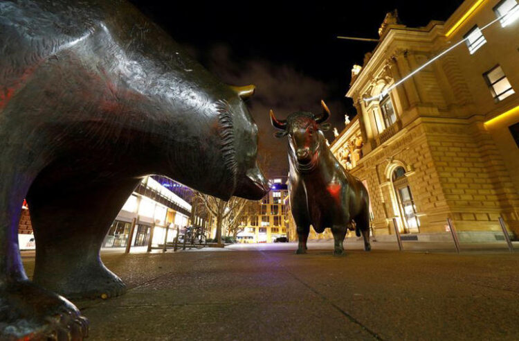 Bull and bear symbols for successful and bad trading are seen in front of the German stock exchange (Deutsche Boerse) in Frankfurt, Germany, February 12, 2019. REUTERS/Kai Pfaffenbach/File Photo