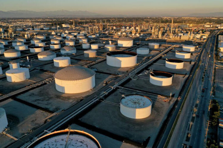 Storage tanks are seen at Marathon Petroleum's Los Angeles Refinery, which processes domestic & imported crude oil into California Air Resources Board (CARB), gasoline, diesel fuel, and other petroleum products, in Carson, California, U.S., March 11, 2022. Picture taken with a drone. REUTERS/Bing Guan/File Photo