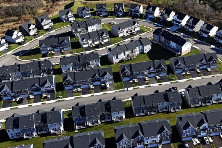 A housing development in Cranberry Township, Pa., is shown on March 29, 2024. The nation's housing market sales slump is dragging on into its third straight year, as evidenced by another weak spring home buying season. (AP Photo/Gene J. Puskar, File)