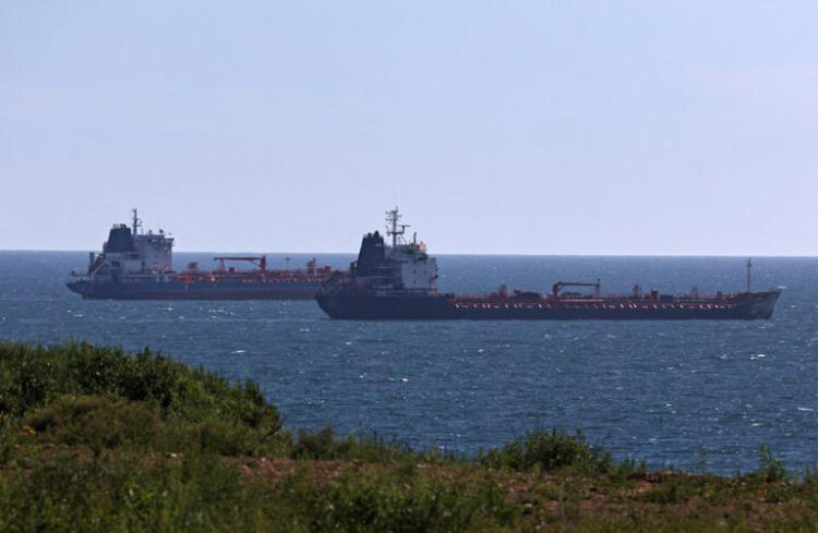 Oil tankers sail along Nakhodka Bay near the port city of Nakhodka, Russia August 12, 2022. REUTERS/Tatiana Meel/File photo