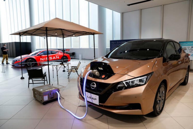 A Nissan Leaf EV car and portable battery on display at Nissan Gallery in Yokohama, Japan November 29, 2021. REUTERS/Androniki Christodoulou/File Photo
