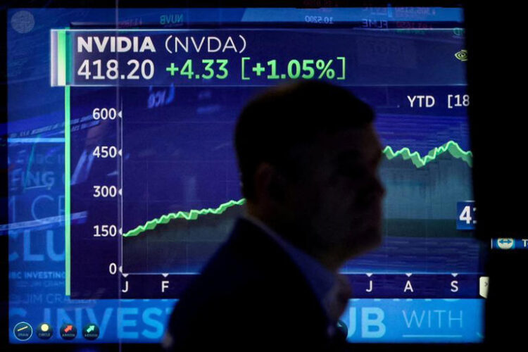 A screen tracks NVIDIA Corp. as a trader works on the floor at the New York Stock Exchange (NYSE) in New York City, U.S., October 23, 2023. REUTERS/Brendan McDermid/File Photo