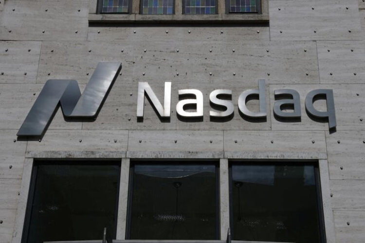 Signage is seen at Nasdaq OMX Copenhagen in Copenhagen, Denmark, July 30, 2022. REUTERS/Andrew Kelly/File Photo