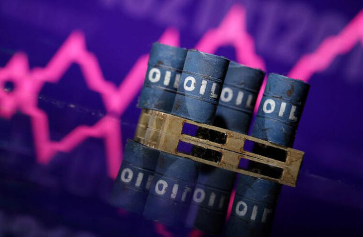 Miniatures of oil barrels and a rising stock graph are seen in this illustration taken January 15, 2024. REUTERS/Dado Ruvic/Illustration/File Photo
