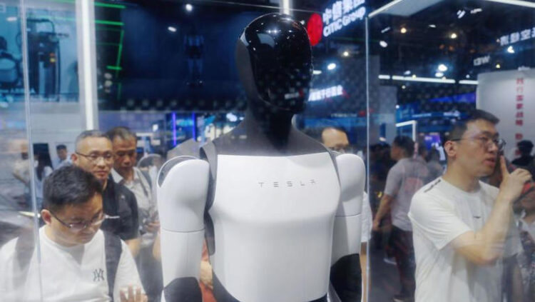 Elon Musk hopes humanoid robots will be performing tasks at Tesla's factories by next year