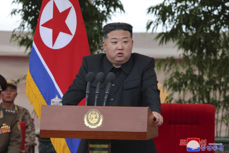 North Korean leader Kim Jong Un speaks as he visits an air force helicopter unit to praise the troops for helping rescue people from recent floods, at an undisclosed location in North Korea, Friday, Aug. 2, 2024. At a "historic event" in North Korean capital Pyongyang on Sunday, Kim personally inspected a "new pivotal attack weapon" that he had helped design, which he said was part of "rapidly and indefinitely developing the military capabilities for self-defense," state news agency KCNA reported.