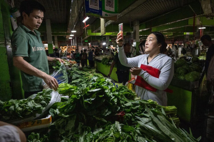 China Consumer Inflation Rises, Factory-Gate Prices Continue to Fall